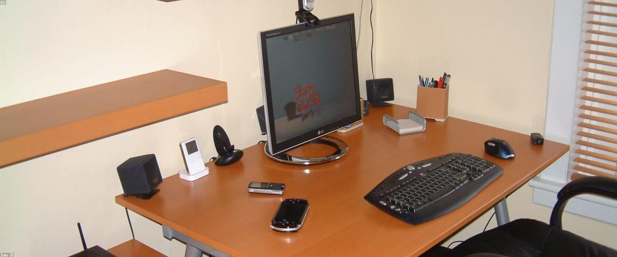 A calm, tidy practitioner's desk with the admin cleared